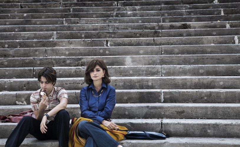 Girl and boy sat on steps